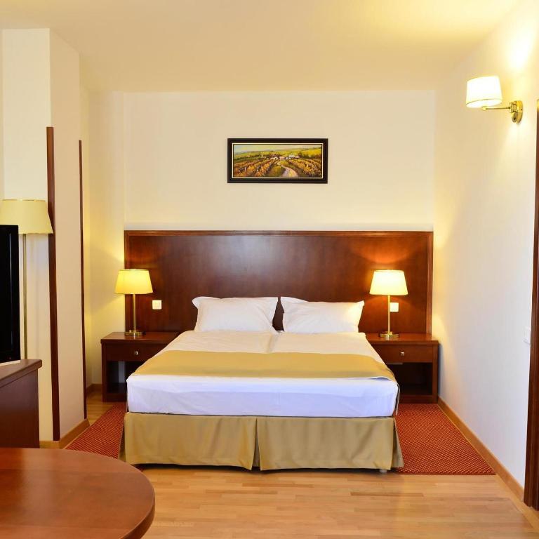 Postel nebo postele na pokoji v ubytování Hotel Miraj