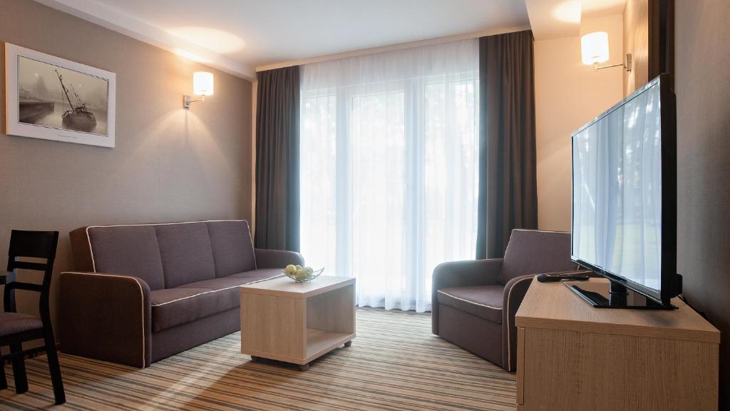 TV a/nebo společenská místnost v ubytování Waterside Resort