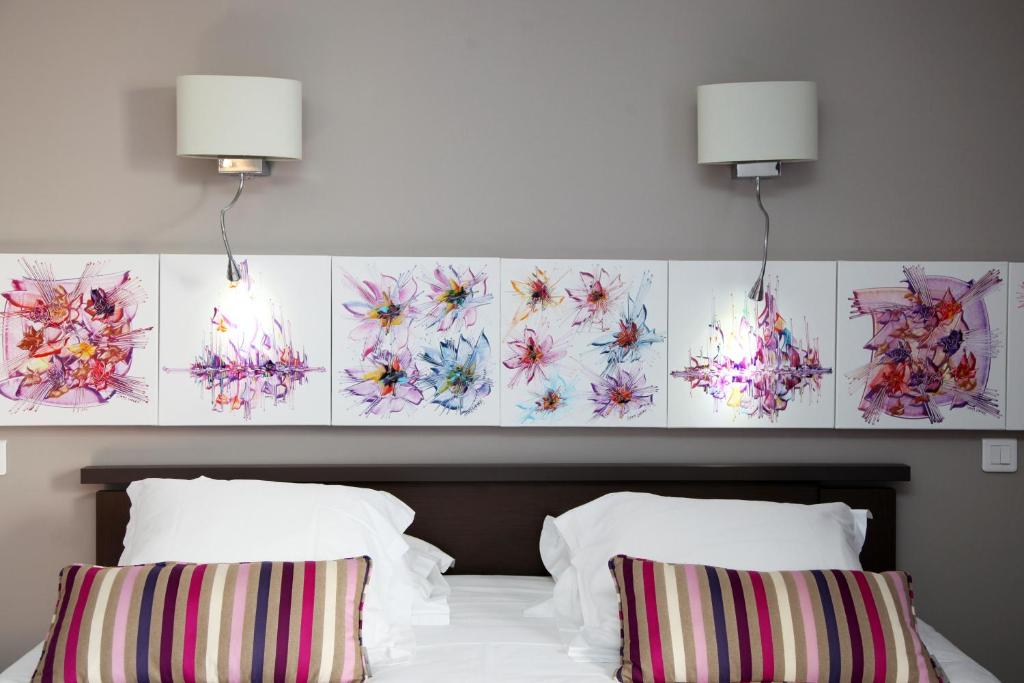 Postel nebo postele na pokoji v ubytování Hotel Scandola