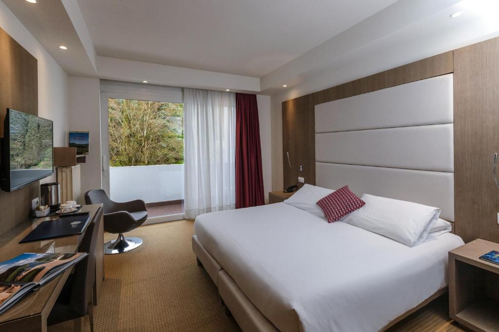 TV a/nebo společenská místnost v ubytování Hotel Terme Millepini