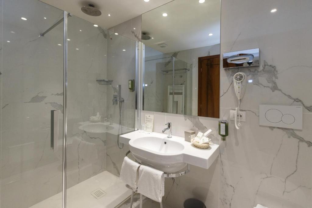 Koupelna v ubytování Hotel Terme Millepini