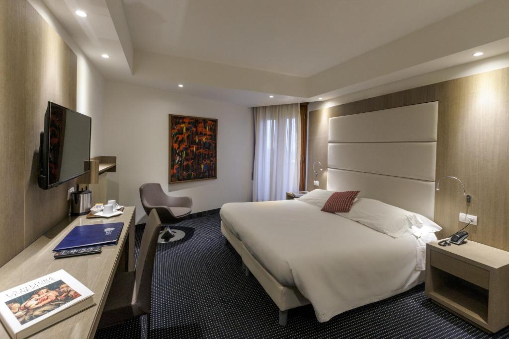 TV a/nebo společenská místnost v ubytování Hotel Terme Millepini