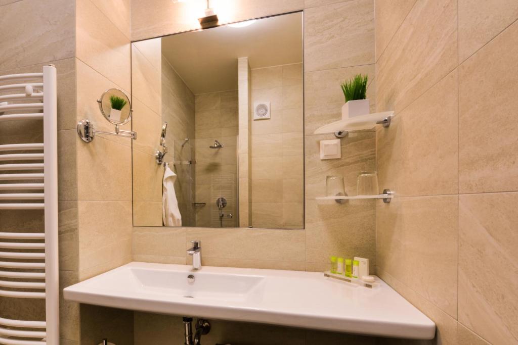 Koupelna v ubytování Grid Hotel
