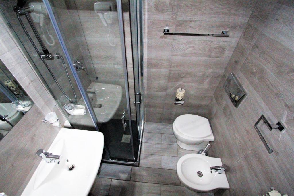 Koupelna v ubytování Hotel Corallo