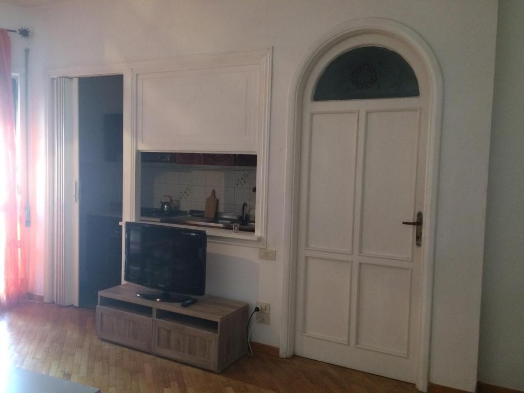 Televízia a/alebo spoločenská miestnosť v ubytovaní Casa Daniele