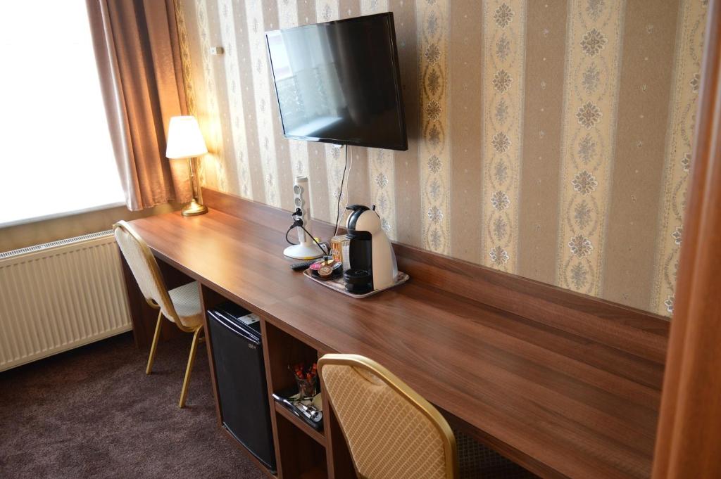 TV a/nebo společenská místnost v ubytování Hotel Lipa