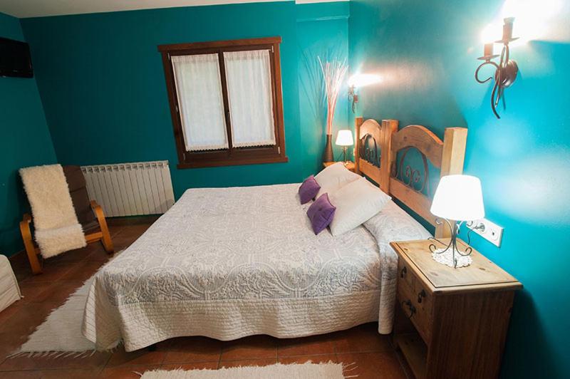 Postel nebo postele na pokoji v ubytování Zubeltzu Torre