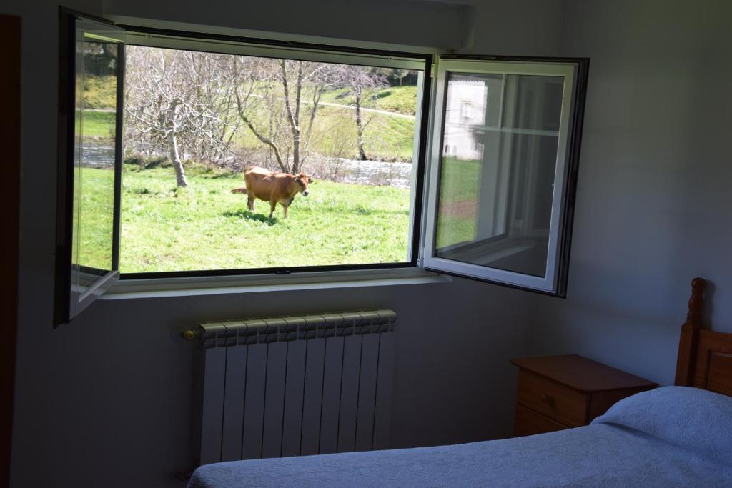 Postel nebo postele na pokoji v ubytování Apartamentos Arredondo