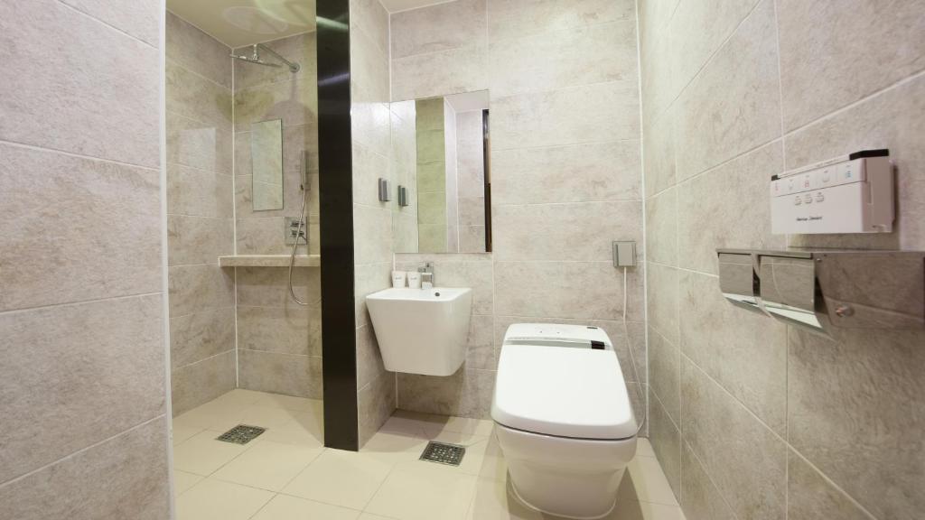 Koupelna v ubytování Rian Hotel