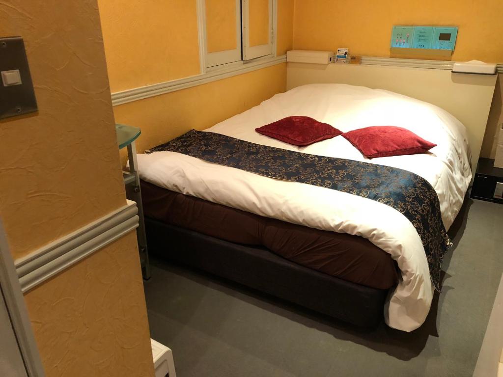 Postel nebo postele na pokoji v ubytování Hotel U