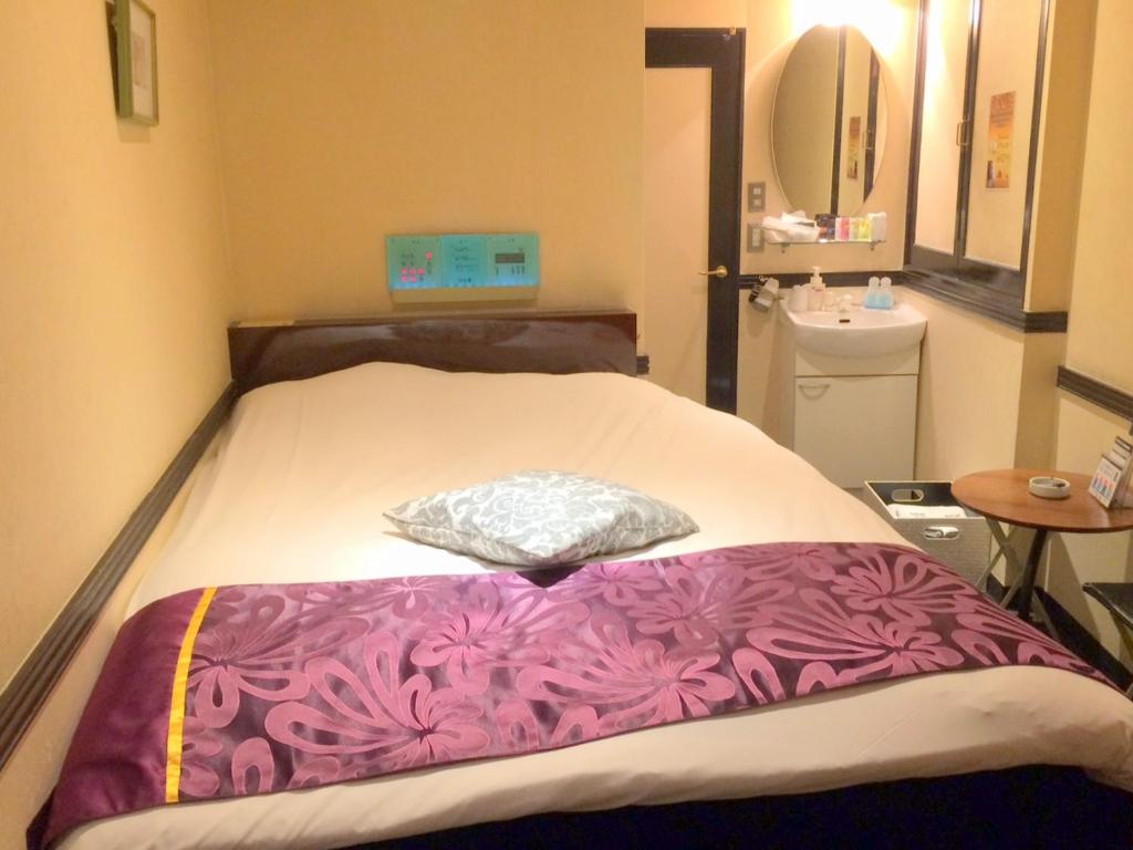Postel nebo postele na pokoji v ubytování Hotel U