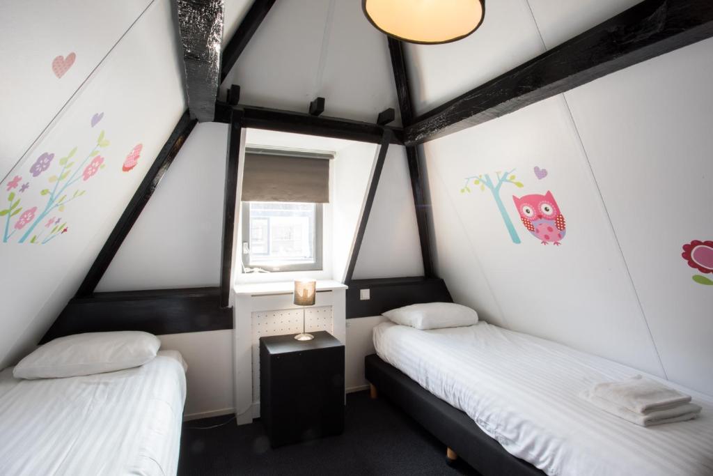 Postel nebo postele na pokoji v ubytování Hotel Zilt