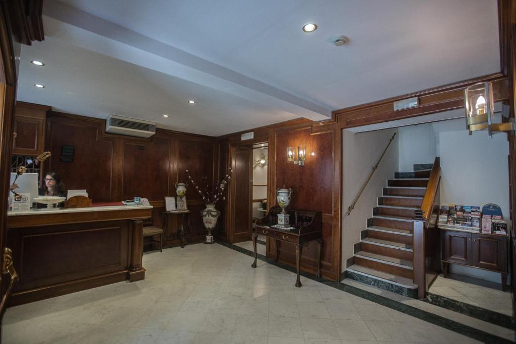 הלובי או אזור הקבלה ב-Hotel Grifo