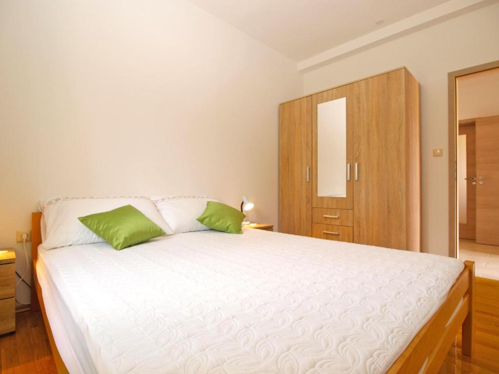 Posteľ alebo postele v izbe v ubytovaní Apartments Stjepan 1573
