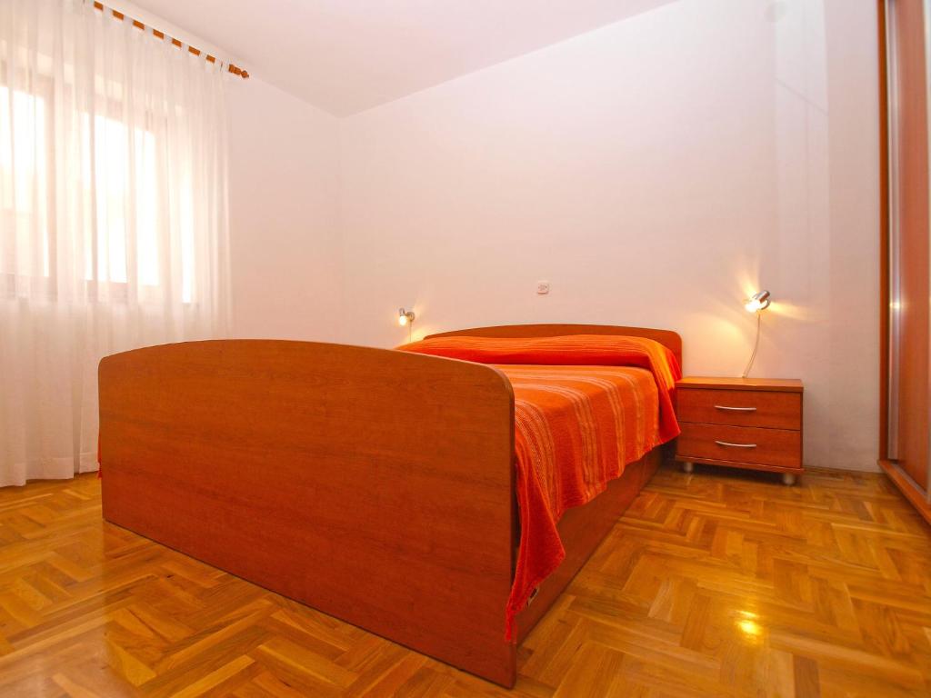 Posteľ alebo postele v izbe v ubytovaní Apartments Stjepan 1573