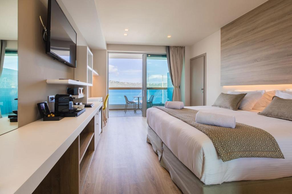 Postel nebo postele na pokoji v ubytování Oniros Residences