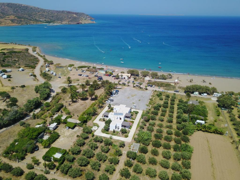 an aerial view of a beach and the ocean at Surf Beach Apartments in Palekastron