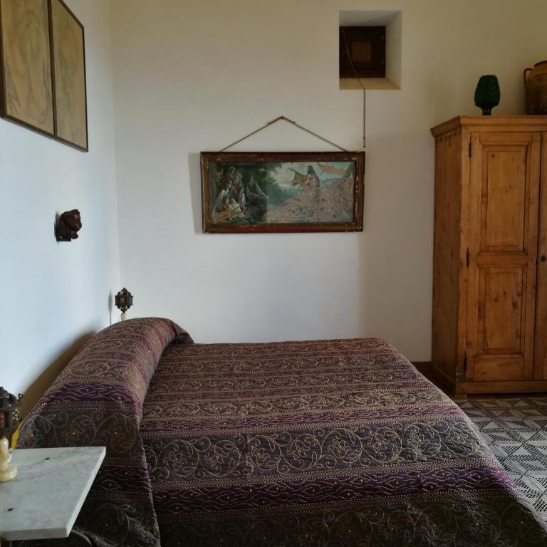 Postel nebo postele na pokoji v ubytování La Locanda del Barbablù