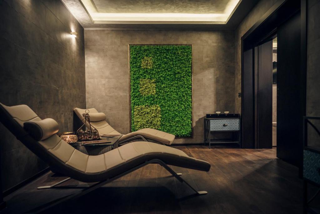 TV a/nebo společenská místnost v ubytování Vega Hotel
