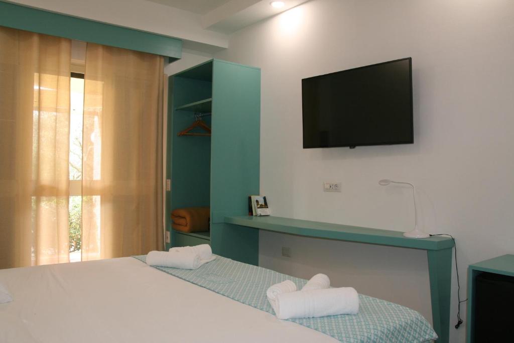 TV a/nebo společenská místnost v ubytování Resort Sciabache