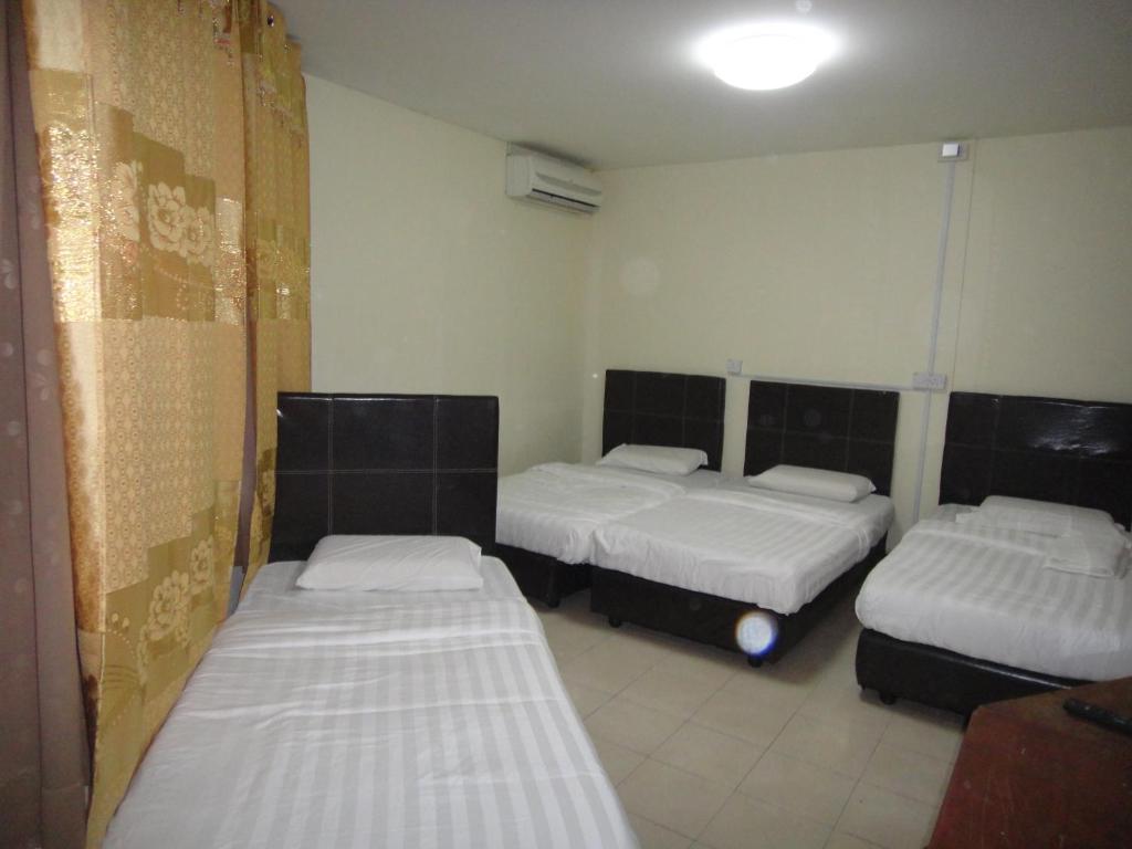 Postel nebo postele na pokoji v ubytování Hotel Ocean