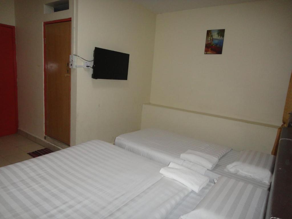 Postel nebo postele na pokoji v ubytování Hotel Ocean