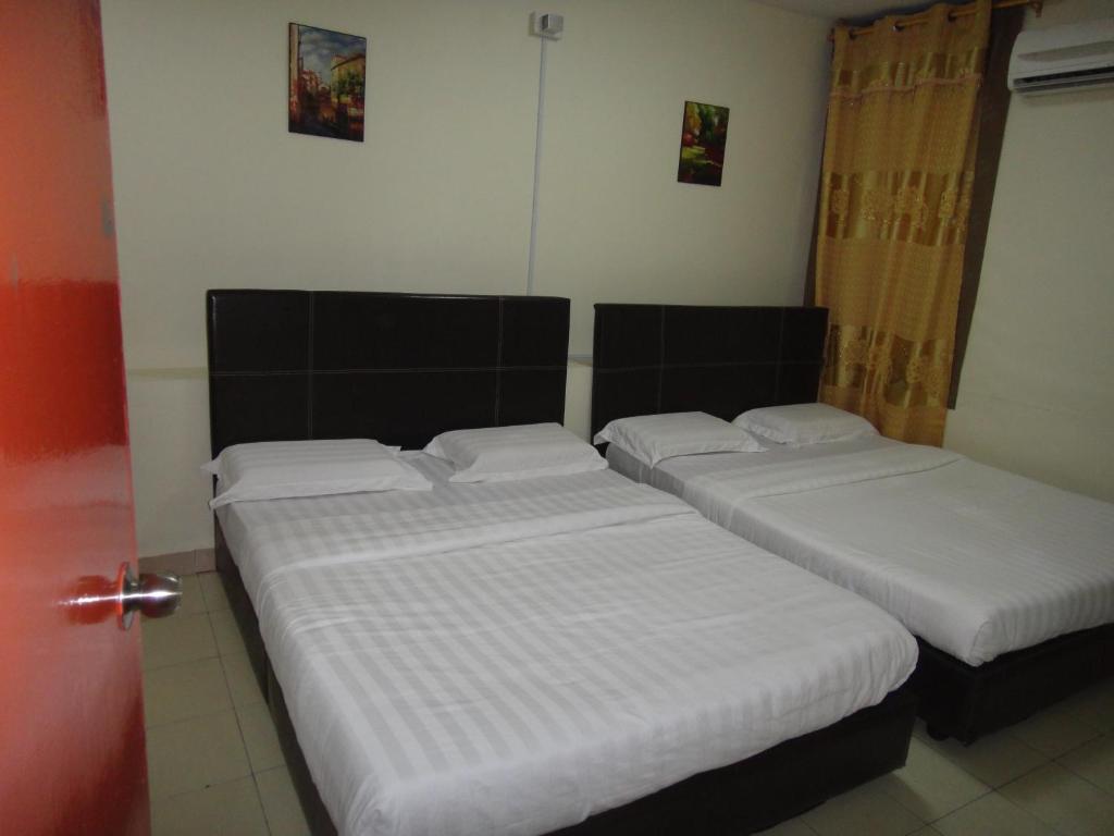 Postel nebo postele na pokoji v ubytování Hotel Ocean