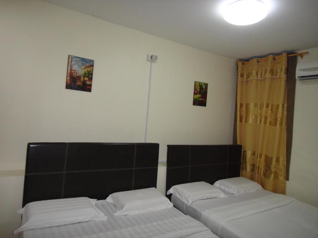 Postel nebo postele na pokoji v ubytování Hotel Ocean