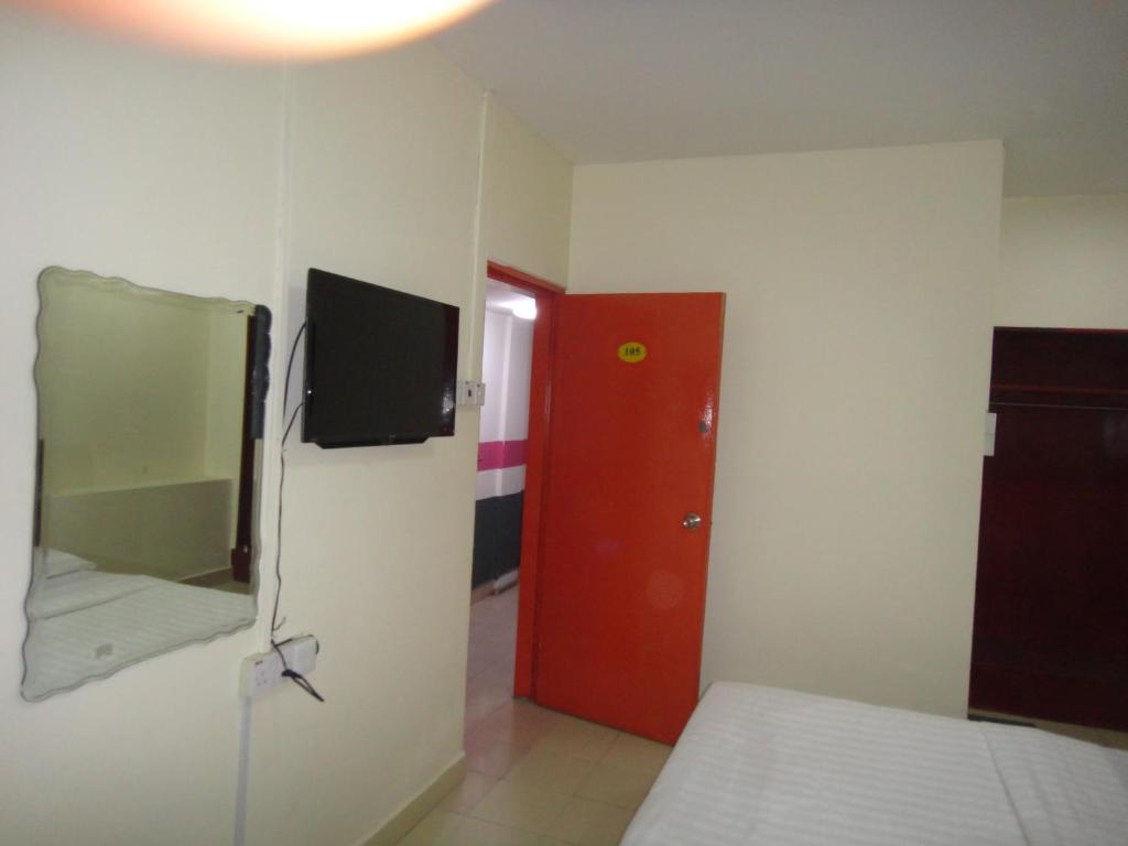 TV a/nebo společenská místnost v ubytování Hotel Ocean