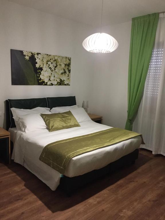 Postel nebo postele na pokoji v ubytování La Gustea Hotel & Cucina