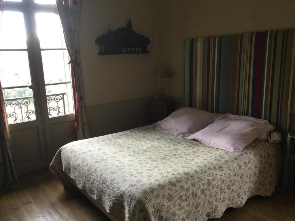 Postel nebo postele na pokoji v ubytování Villa Delphina