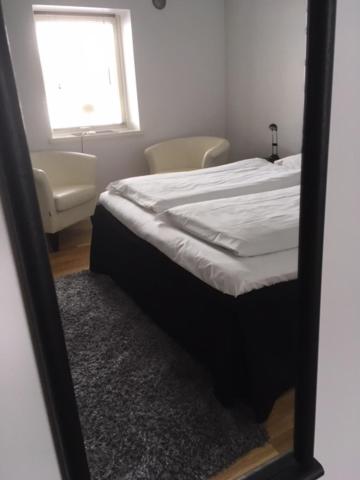 Postel nebo postele na pokoji v ubytování Borrby Frö B&B