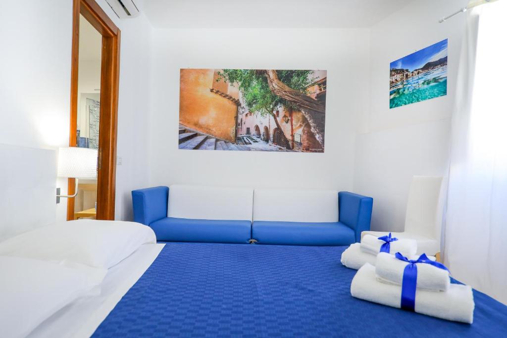 Posteľ alebo postele v izbe v ubytovaní Cefalu in Blu