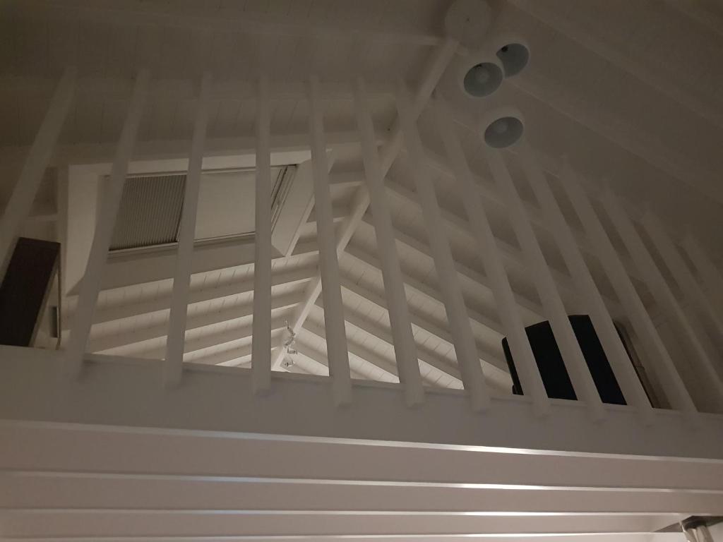 a ceiling in a room with a white ceiling at Casa Vista da Marquesa in Nordeste
