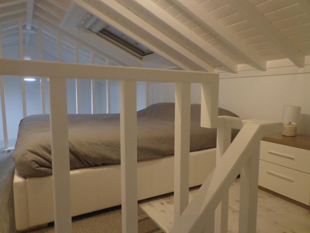 a bed in a loft bed frame in a bedroom at Casa Vista da Marquesa in Nordeste