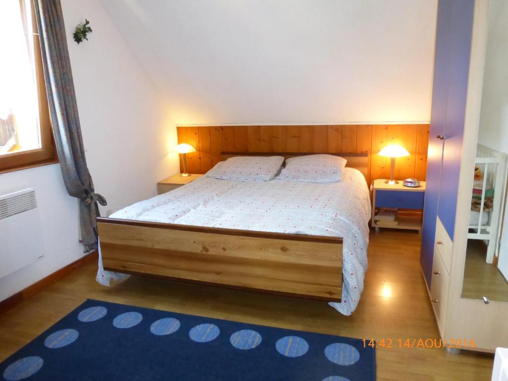 Posteľ alebo postele v izbe v ubytovaní Maison independante de montagne en ALSACE