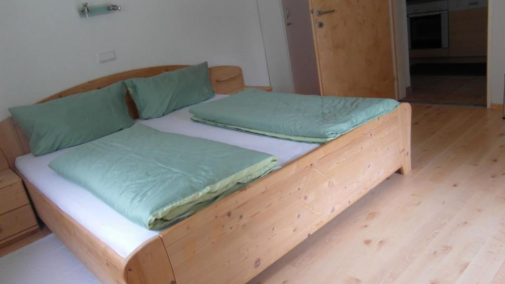 Postel nebo postele na pokoji v ubytování Luenerhof