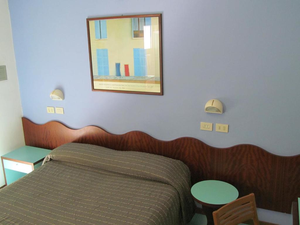 Postel nebo postele na pokoji v ubytování Hotel Gambrinus