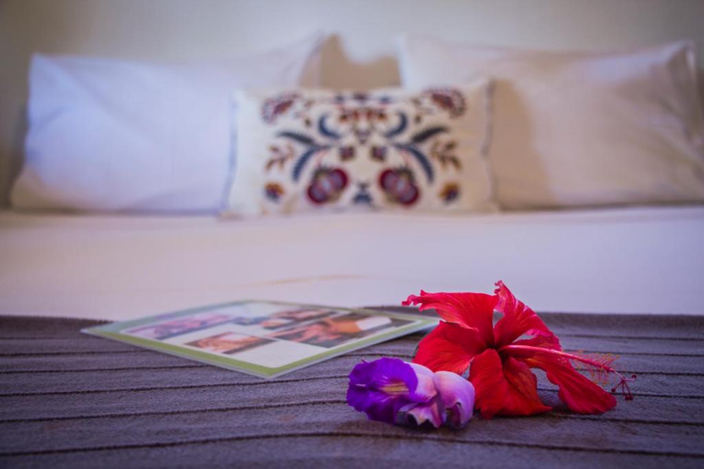Cama ou camas em um quarto em Planeta Banana Paraty