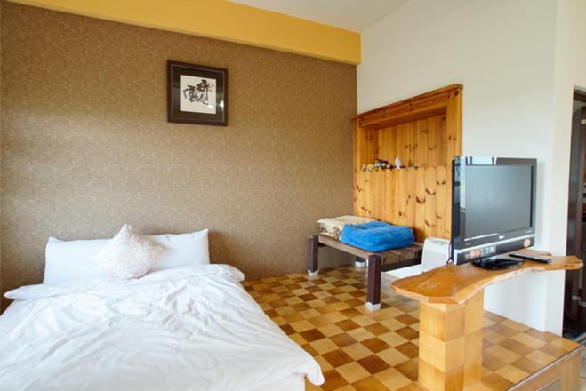 TV a/nebo společenská místnost v ubytování Xian Qing Yu Zhi Homestay