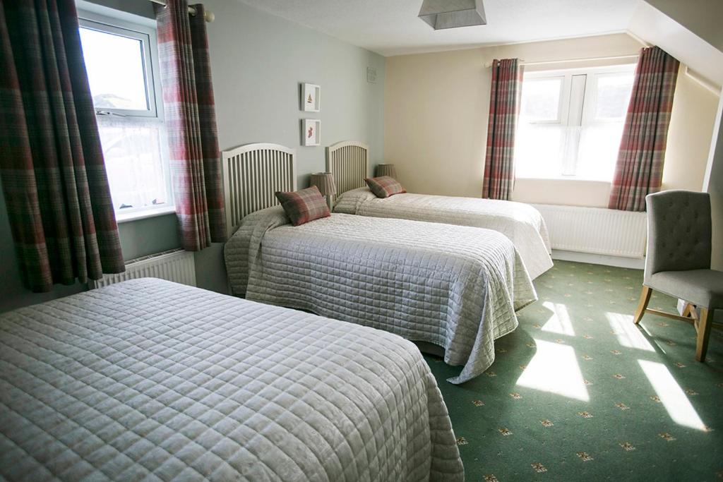 Letto o letti in una camera di Moloney House