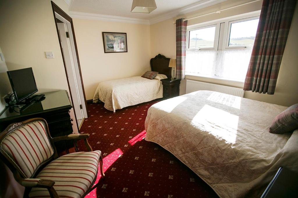 Letto o letti in una camera di Moloney House