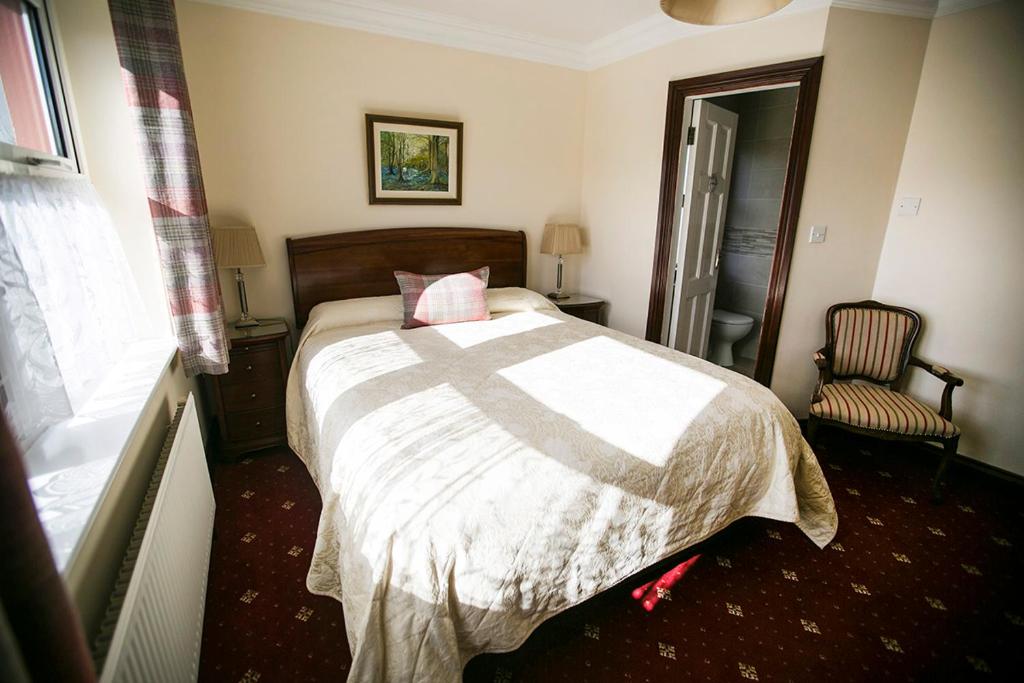 Letto o letti in una camera di Moloney House
