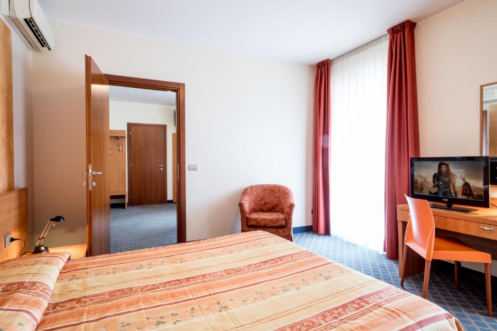 TV a/nebo společenská místnost v ubytování Hotel San Vito