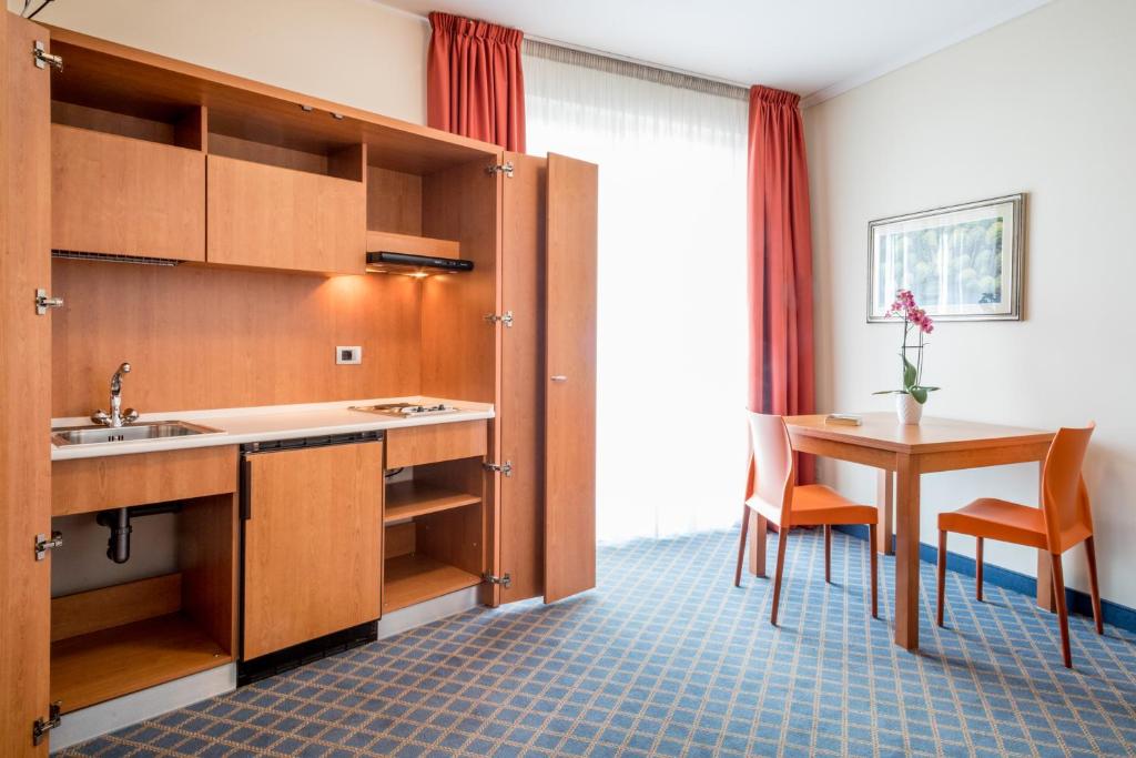 Kuchyň nebo kuchyňský kout v ubytování Hotel San Vito