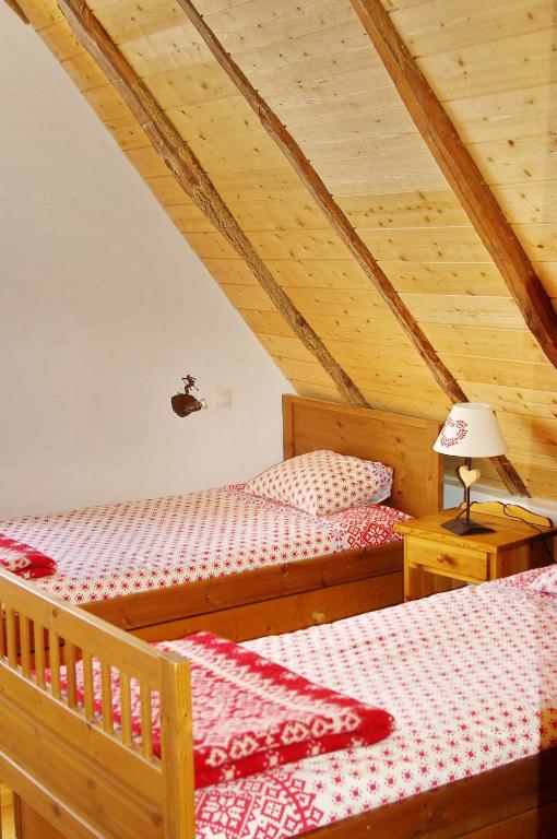 Postel nebo postele na pokoji v ubytování Gite Auberge La Soulan - gite de montagne