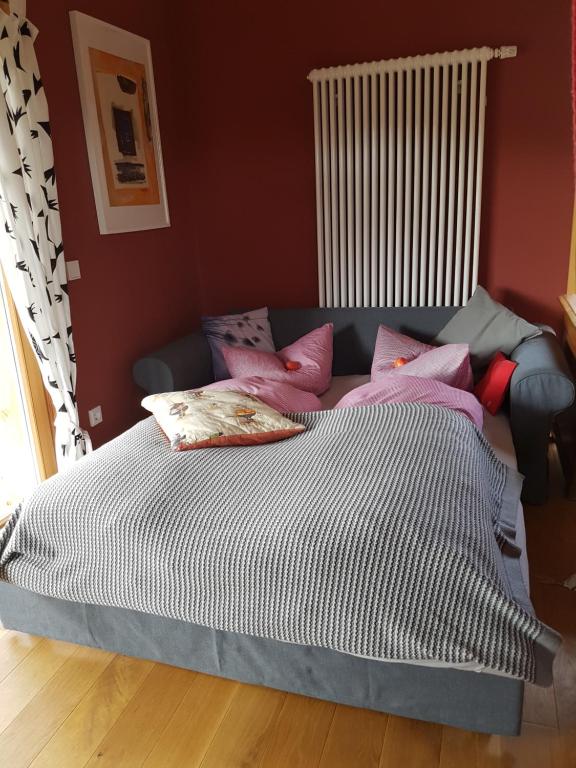 Postel nebo postele na pokoji v ubytování Holzmichel