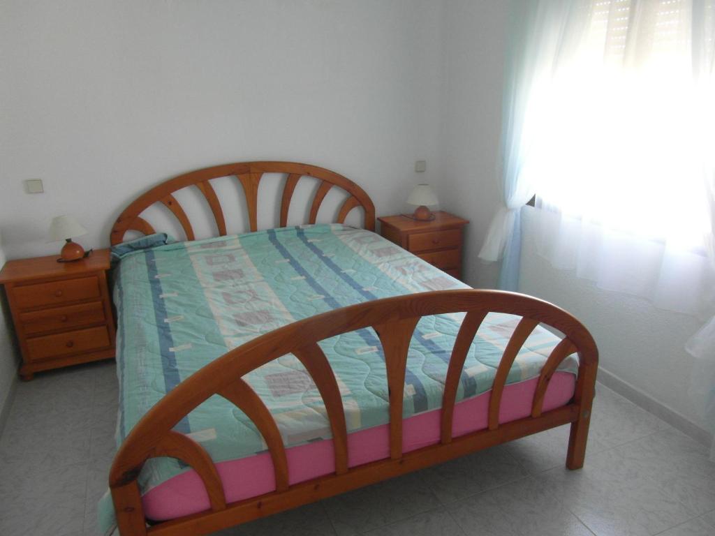 Postel nebo postele na pokoji v ubytování Apartamento con jardin