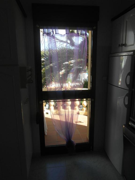 Kuchyň nebo kuchyňský kout v ubytování Apartamento con jardin