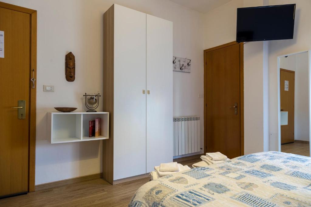 Postel nebo postele na pokoji v ubytování Albergo Felice
